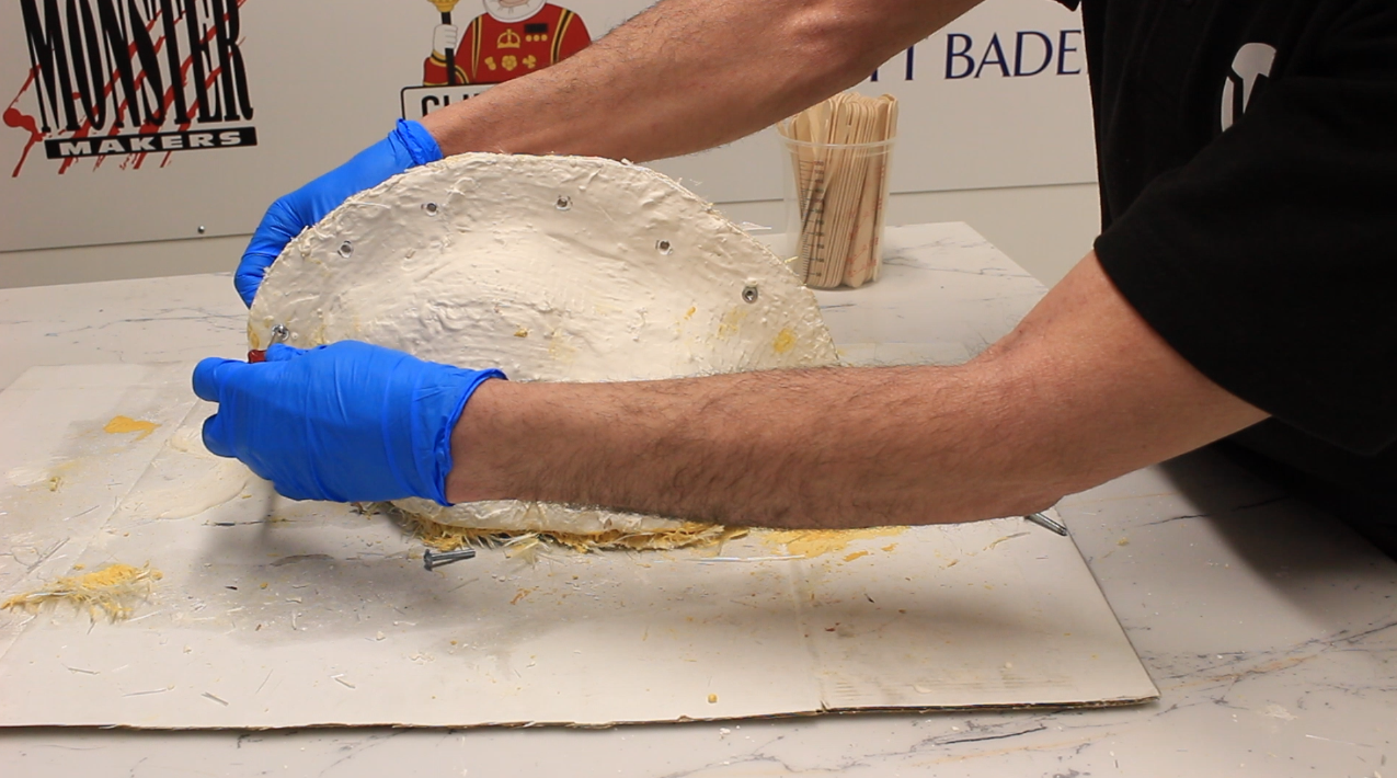 Removing the cast from its mould. 